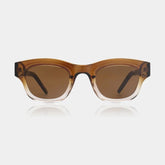 Unisex sunglasses with a rounded top and linear bottom design, featuring smoke and champagne color frames with tinted lenses.