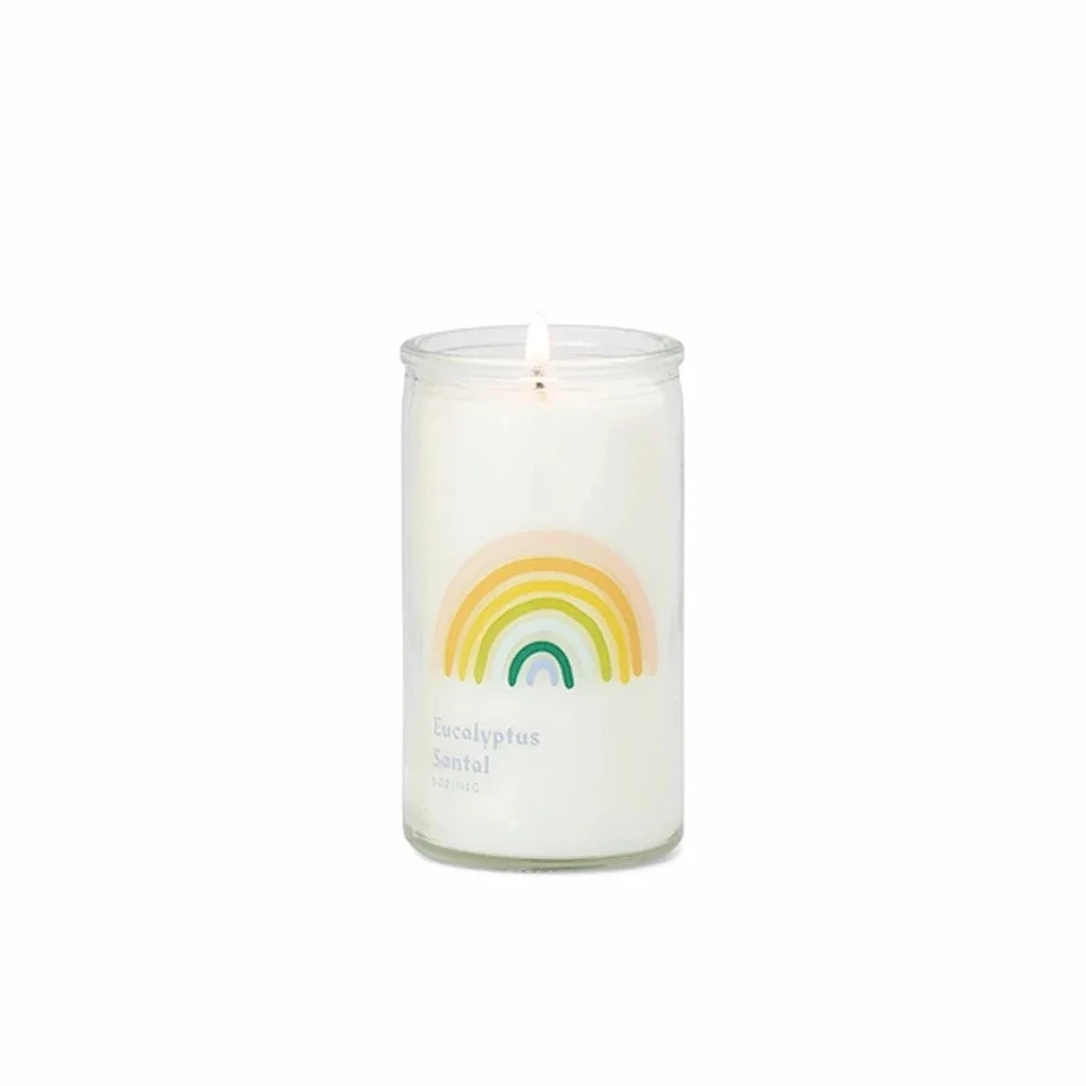 Candle with a rainbow design on a white background