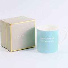 Susan O’Hanlon Mug - Sh*t Creek Survivor