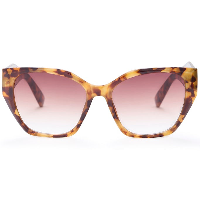 Tortoiseshell cat-eye sunglasses with gradient lenses on a white background