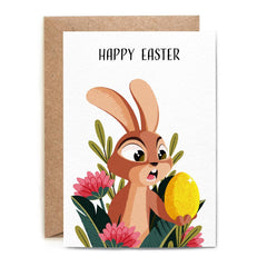 happy easter' written on top. bunny finds a golden Easter egg inside of the flower heap. base white