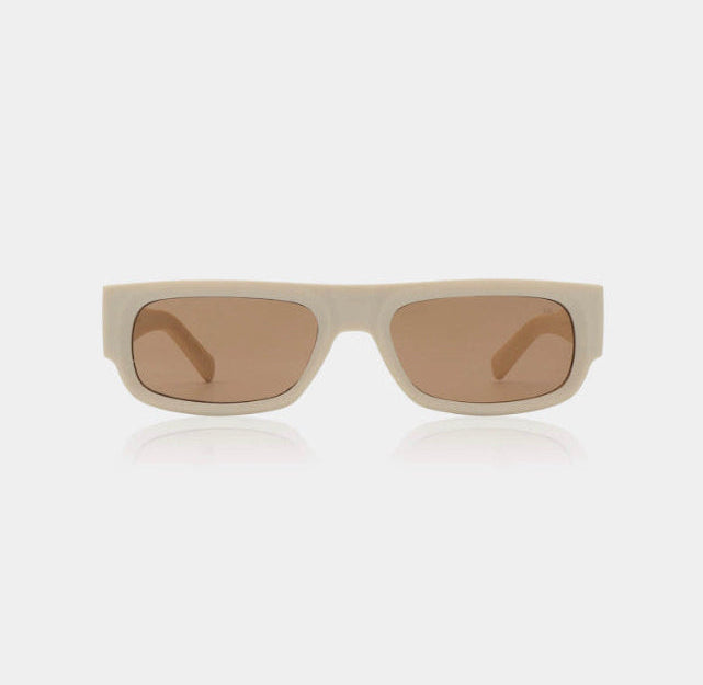 A pair of sunglasses with a retro oblong frame in a beige color with brown lenses.