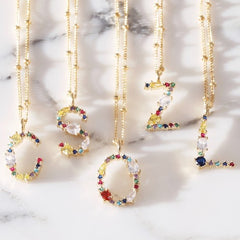 Lisa Angel Rainbow Crystal Initial Necklace in Gold
