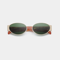 Round sunglasses with a gold frame and green lenses on a white background