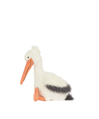 Stuffed pelican toy on a white background