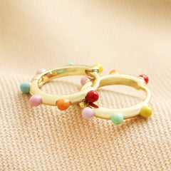 Lisa Angel Colourful Enamel Pom Pom Huggie Hoop Earrings in Gold