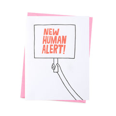 a hand carries 'new human alert' written banner. base white