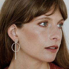 Circle Bar Drop Earrings in Silver + Gold by Christin Ranger